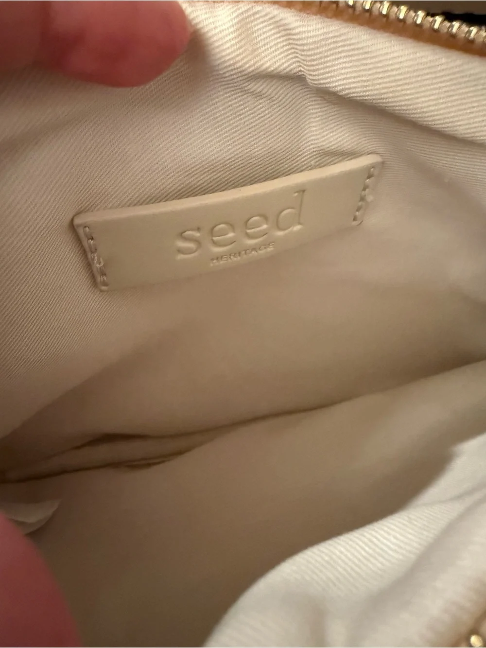Seed Heritage cream & tan woven pouch with initial H. Gold hardware and initial.